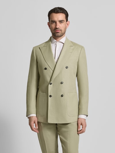 Männermodel trägt Slim Fit Sakko aus Viskose Modell 'Joachim' von Tiger Of Sweden, hellgrün, glatte Textur, Ganzkörperansicht von vorne. Reverskragen, Knopfverschluss, Eingrifftaschen, Rückenlänge 78 cm, Schulterbreite 44 cm, Ärmellänge 65 cm.