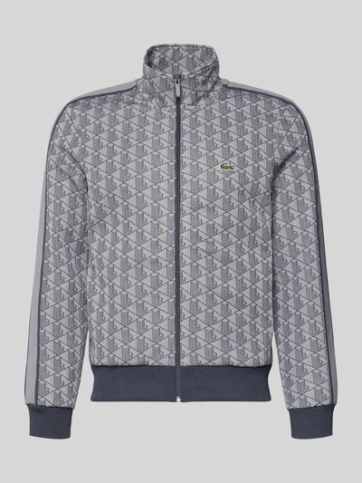 Produktfoto, Regular Fit Sweatjacke mit Baumwoll-Anteil von Lacoste in Optik: Unifarben, Optik:Allover-Muster, Regular-Fit Passform, Reißverschluss, L-Monogramm Muster, Logo-Patch, Kontraststreifen, Stehkragen, Langarm, gerippter Ärmel- und Rumpfabschluss, seitliche Eingrifftaschen, Materialverarbeitung: Sweat