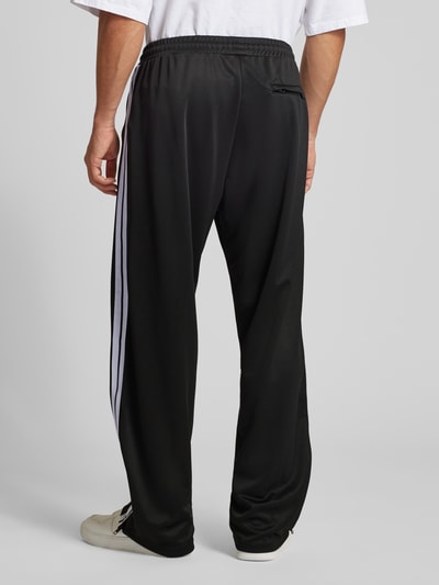 Review X MATW REVIEW X MATW - Regular Fit Trackpants mit Label-Print Black 5