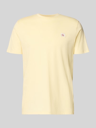Produktfoto, T-Shirt mit Label-Badge von Calvin Klein Jeans in Gelb, Reine Baumwolle, Regular-Fit, Rundhalsausschnitt, Rückenlänge 70 cm bei Größe M