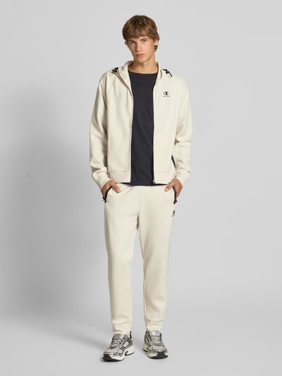 CHAMPION Spodnie dresowe z elastycznym pasem i tunelem Złamany biały 1