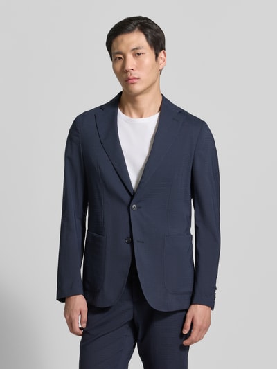 Männermodel trägt Slim Fit Anzugsakko aus Woll-Mix Modell 'P-HANRY-WG-PK' van BOSS, look: effen, steekzakken, binnenzak, ganzkörperansicht von vorne.