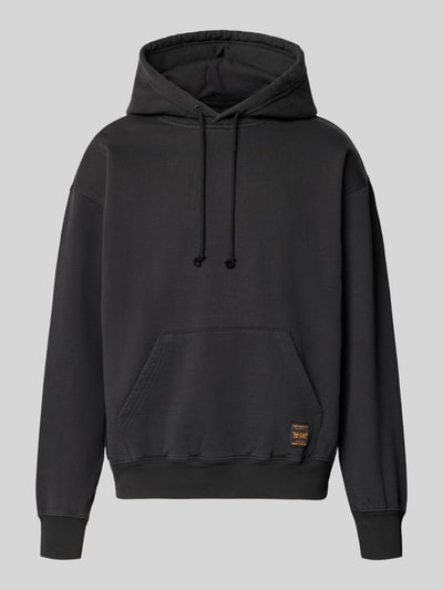 Produktfoto, Relaxed Fit Hoodie aus Baumwoll-Mix Modell 'JET BL' von Levi's®, einfarbiges Schwarz mit Kängurutasche und Logopatch, glatte Textur