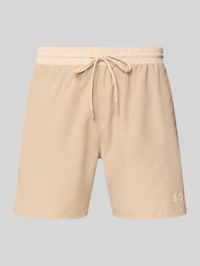 Productfoto, unifarben beige, elastische taille met trekkoord, zijzakken, contrastnaden, labelprint. Badeshorts met Kontrast-Logo Modell 'STARFISH' van BOSS