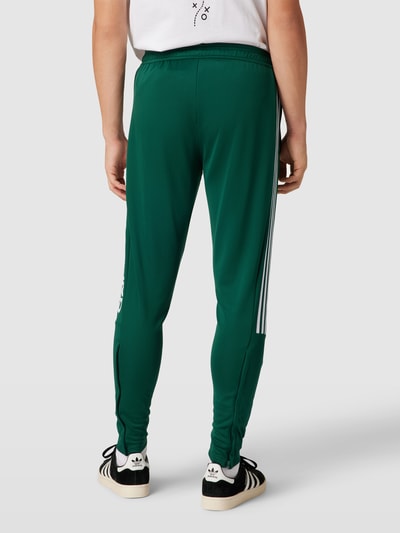 Modells adidas deals tiro pants