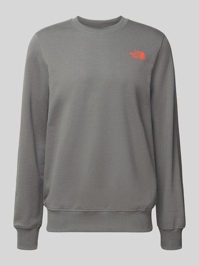 Produktfoto, Sweatshirt mit Label-Print von The North Face z bawełny, krój regular fit, prążkowane wykończenia, okrągły dekolt, nadruk z logo.