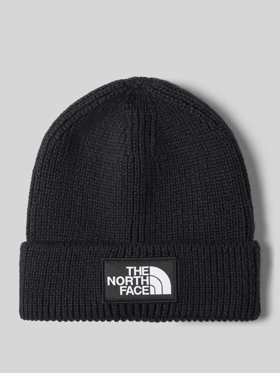 Produktfoto, Beanie in Ripp-Optik von The North Face, schwarz, grobe Strickstruktur, Label-Patch, breiter Umschlag, elastischer Mix