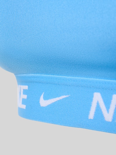 Produktfoto, Slim Fit Sport-BH mit Logo-Detail Modell 'Indy' von NIKE TRAINING, elastyczna mieszanka materiałów, krój slim fit, niebieski kolor, detal z logo