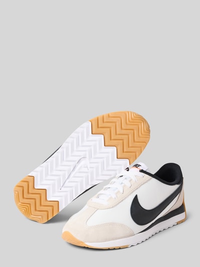 Produktfoto, Sneaker mit Label-Applikation Modell 'Pacific' von Nike für Damen, abgerundete Form, Schnürverschluss, strukturierte Sohle, weiß-schwarz, Absatzhöhe 2 cm, Schafthöhe 8 cm, Schaftweite 9 cm