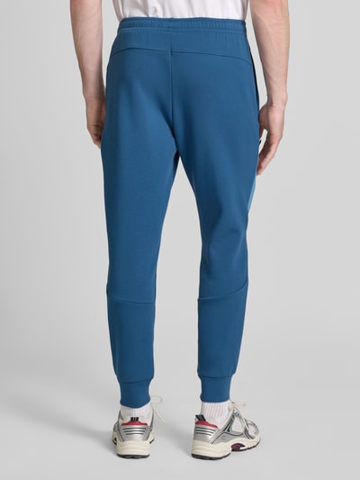 Under Armour Regular Fit Sweatpants mit Logo-Print Modell 'Unstoppable' Blau 5