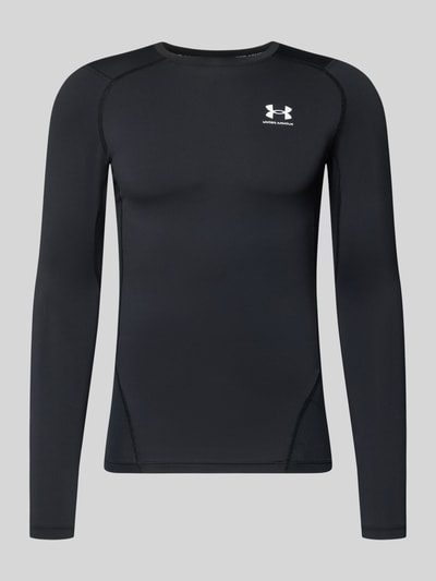 Produktfoto, schwarzer Slim Fit Longsleeve mit Logo-Print von Under Armour, elastischer Material-Mix, Rundhalsausschnitt, für Herren.