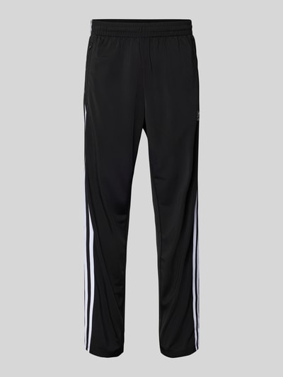 adidas Originals Spodnie treningowe z kieszeniami zapinanymi na zamek błyskawiczny model ‘FIREBIRD’ Czarny 2