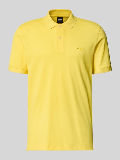 Produktfoto, Regular Fit Poloshirt aus reiner Baumwolle Modell 'PALLAS' von BOSS, unifarben gelb, Piqué-Textur, kurze Knopfleiste, Label Stitching