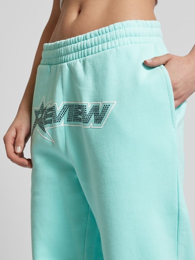 Review Tapered fit sweatpants met label met strass-steentjes Turquoise - 3