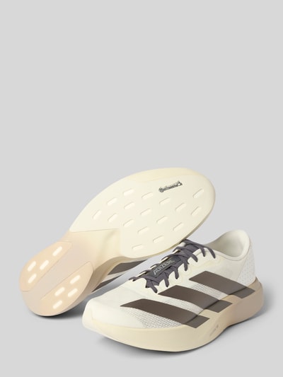 Produktfoto, Sneaker mit Schnürung von adidas Sportswear für Herren in Beige und Weiß mit grauen Details, glatte Textur, seitlich und Sohle sichtbar