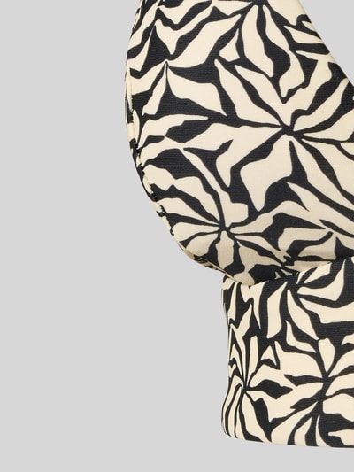 Frauenmodel trägt Bikini-Oberteil mit V-Ausschnitt Modell 'Mahry' von Barts im Schwarz-Weiß-Design, Material-Mix mit Stretch-Anteil, Nahaufnahme Oberkörper.
