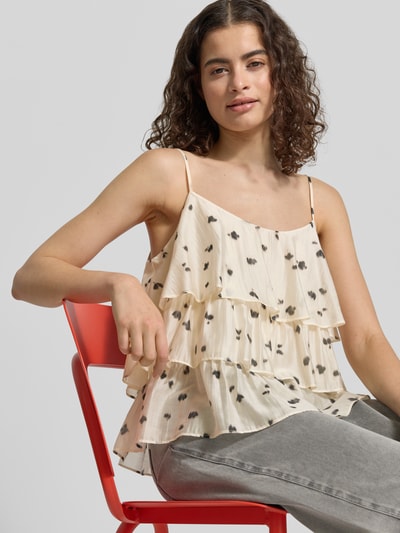 Frauenmodel trägt Blusentop aus Lyocell-Mix im Stufen-Look von JAKE*S STUDIO WOMAN, creme mit schwarzen Punkten, Regular-Fit, Nahaufnahme Oberkörper, Rückenlänge bei Größe 38: 41 cm, verstellbare Spaghettiträger.