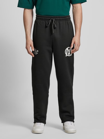Multiply Apparel Spodnie dresowe o kroju regular fit z nadrukiem z logo Czarny 4