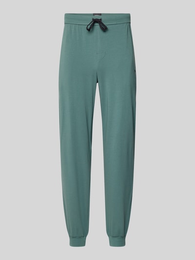 Productfoto, Comfort Fit Sweathose aus Baumwoll-Mix Modell 'MIX&MATCH PANTS' van BOSS in effen groen, geribd, jerseytextuur, elastische taille en pijpen, met zijzakken en label stitching.