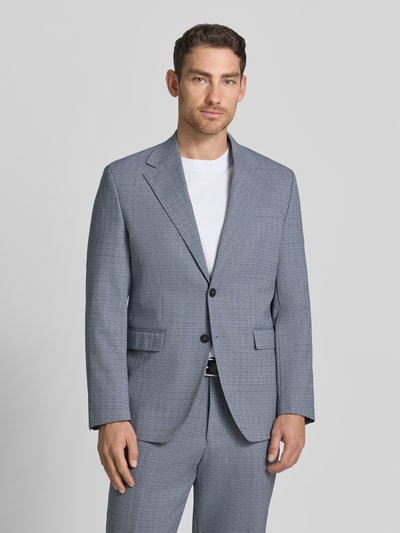 Männermodel trägt Regular Fit Anzugsakko aus Woll-Mix Modell 'DUKE' von SELECTED HOMME in Melange-Optik mit Reverskragen, Ganzkörperansicht von vorne.