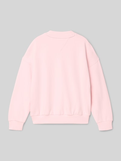 Produktfoto, Regular Fit Sweatshirt uit katoenmix van Tommy Hilfiger Teens in effen roze met geribde boorden en sweatstructuur.