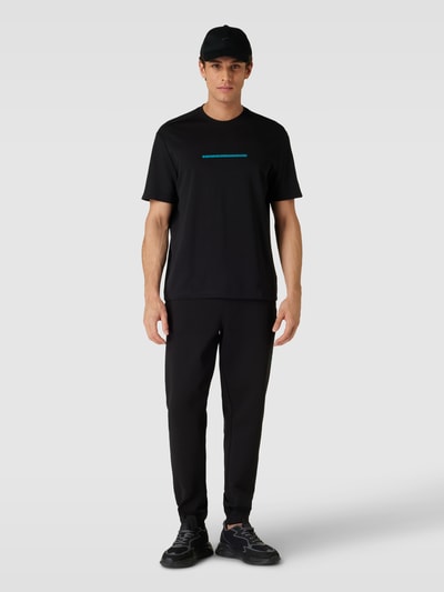 CK Calvin Klein Spodnie dresowe o kroju comfort fit w jednolitym kolorze Czarny 1