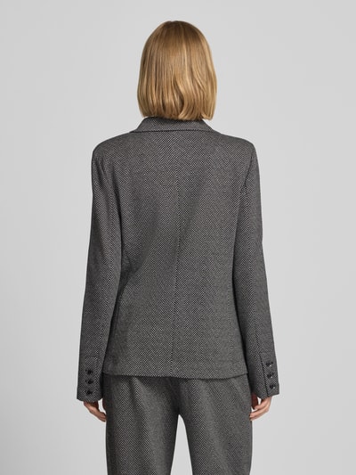 Frauenmodel trägt Regular Fit Blazer mit Pattentaschen von Emporio Armani, Baumwoll-Mix mit Stretch, Allover-Look, Ganzkörperansicht Rückansicht.