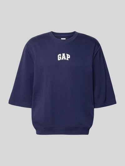 Produktfoto, T-Shirt mit Rundhalsausschnitt und Logo-Print von GAP, dunkelblauer Baumwoll-Mix, lockerer Schnitt, weiße Schrift, glatte Textur