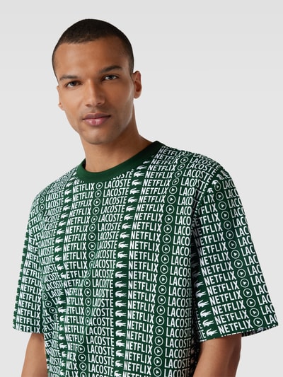 Lacoste LACOSTE x Netflix - T-shirt met all-over print Flessengroen - 3