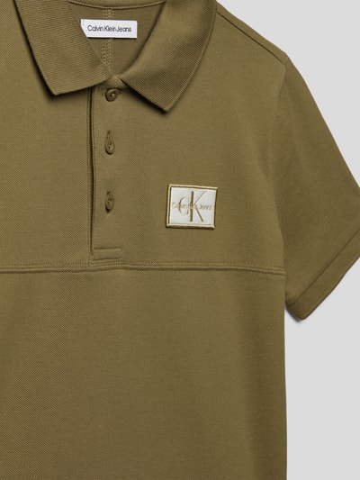 Calvin Klein Jeans Koszulka polo z naszywką z logo model ‘BADGE PIQUE’ Czekoladowy 2