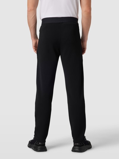 EA7 Emporio Armani Spodnie dresowe z aplikacją z logo model ‘PANTALONI’ Czarny 5