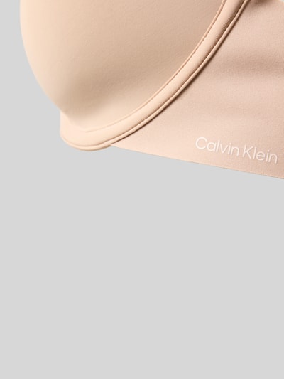 Produktfoto, Biustonosz z fiszbinami z mieszanki materiałów z dodatkiem streczu Calvin Klein, detal z logo, model 'MONOWIRE', kolor beżowy