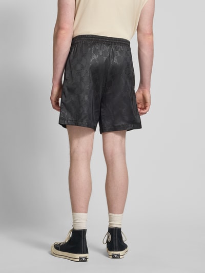 KARL KANI Relaxed Fit Shorts mit Allover-Logo-Print Modell 'Signature' Black 5
