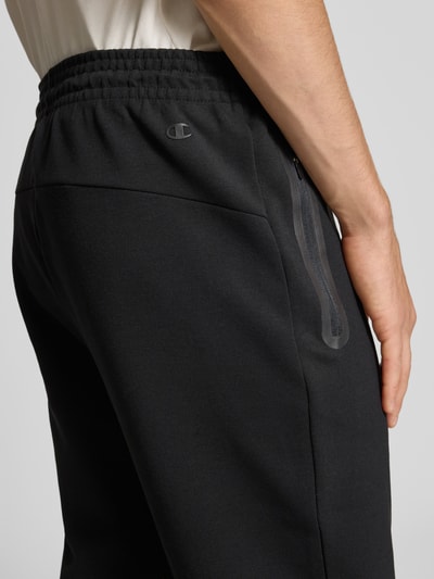 CHAMPION Spodnie dresowe z elastycznym pasem i tunelem Czarny 3
