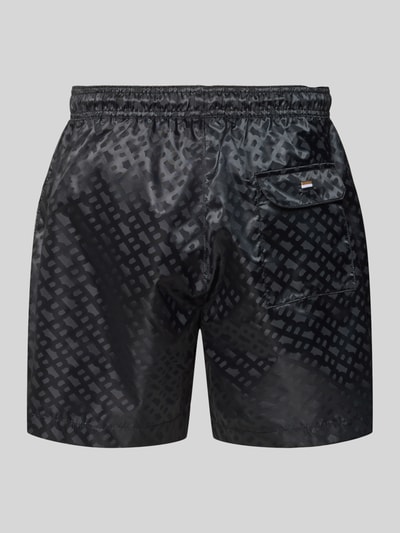 Produktfoto, Regular Fit Badeshorts mit Tunnelzug Modell 'JACQUES' von BOSS, schwarz, unifarbene Satin-Struktur, Logo-Muster, Gesäßtasche, Rückansicht.