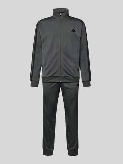 Produktfoto, dunkelgrauer Slim Fit Trainingsanzug mit Logo-Stitching von adidas Sportswear, Reißverschluss, Stehkragen, elastische Abschlüsse