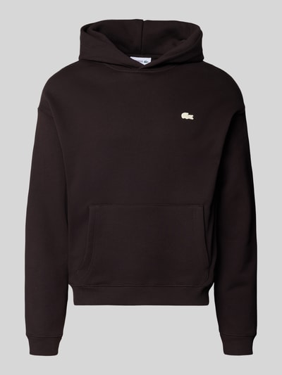 Produktfoto, Regular Fit Hoodie aus reiner Baumwolle von Lacoste, Optik: Unifarben, Label-Patch, Kapuze, Langarm, Kängurutasche, Sweat, schwarze Farbe