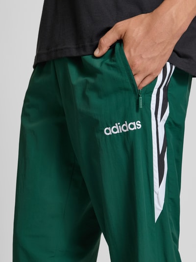 adidas Originals Spodnie dresowe z elastycznym ściągaczem Ciemnozielony 3