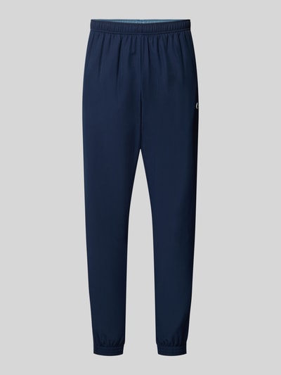 Produktfoto, Regular Fit Trainingshose mit verstellbarem Gummibund von Lacoste in Dunkelblau, glatte Textur, Herren Trainingshose von Lacoste Sport