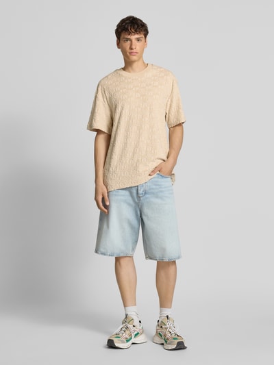 KARL KANI T-shirt in all-over look met ronde hals Zand - 1