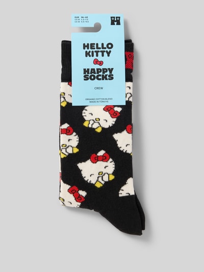 Produktfoto, bunte Socken aus Baumwollmix mit Hello Kitty Laughing Motiv und Label-Detail, Produktname Socken aus Baumwoll-Mix Modell 'HELLO KITTY LAUGHING' von Happy Socks, Hintergrund in Grau, Damensocken, elastisches Rippenbündchen