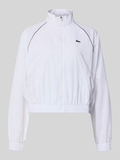 Produktfoto, Relaxed Fit Trainingsjacke mit Logo-Patch von Lacoste in Weiß, glatte Oberfläche, Damen Trainingsjacke von Lacoste Sport