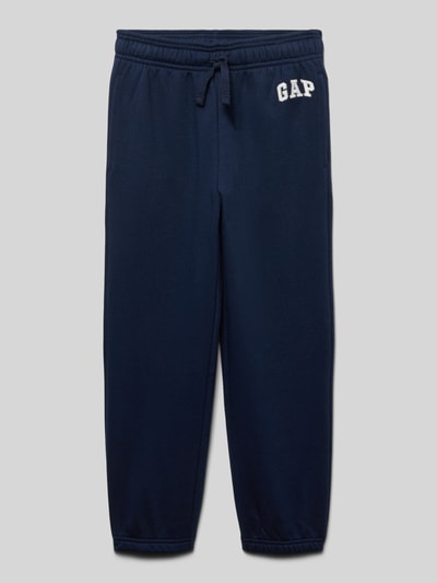 Productfoto, Sweatpants met elastische tailleband en logo van GAP, donkerblauwe katoenen mix, regular fit, steekzakken, logo, binnenbeenlengte maat 116: 50 cm
