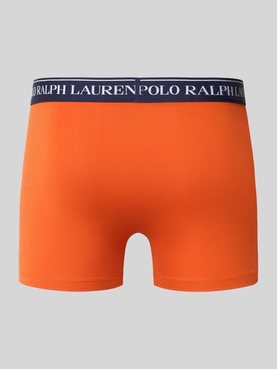Produktfoto, orangefarbene Pant & Trunk aus Baumwoll-Mix im 3er-Pack von Levi's®, glatte Struktur, schlichte Form, grauer Hintergrund.