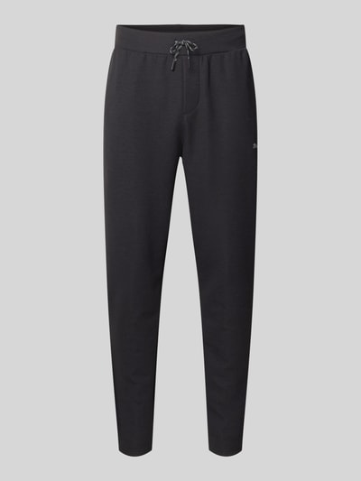 Produktfoto, schwarze Regular Fit Sweatpants mit Lyocell-Anteil von PUMA PERFORMANCE, elastischer Bund, Tunnelzug, Logo-Detail, glatte Textur