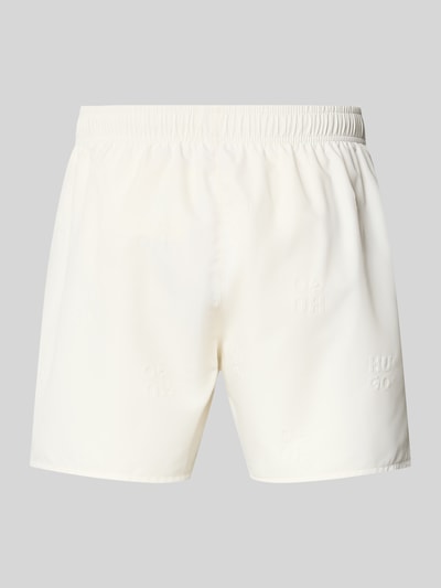 Produktfoto, Regular Fit Badeshorts mit Label-Prägung Modell 'TONAL' von HUGO, Optik: Unifarben, Passform: Regular-Fit, elastischer Bundabschluss, seitliche Eingrifftaschen, glatte einfarbige Textur in Weiß.