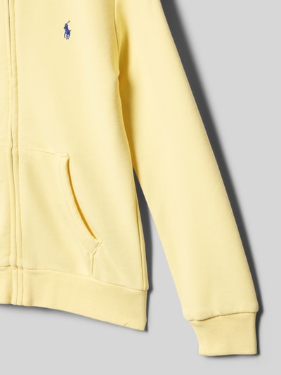 Produktfoto, Regular Fit Sweatjacke aus Baumwoll-Mix von Polo Ralph Lauren Kids in Optik: Unifarben, mit Logo-Stitching und Kängurutasche, Materialverarbeitung: Sweat, Farbe Gelb, Reißverschluss, gerippte Ärmel- und Rumpfabschlüsse