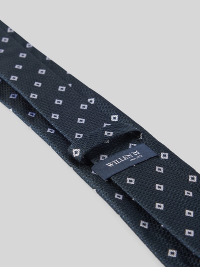 Produktfoto, Krawatte aus Seide im Allover-Look (8 cm) von Willen, dunkelblau mit weißem Muster, feine Struktur, Label-Detail sichtbar.