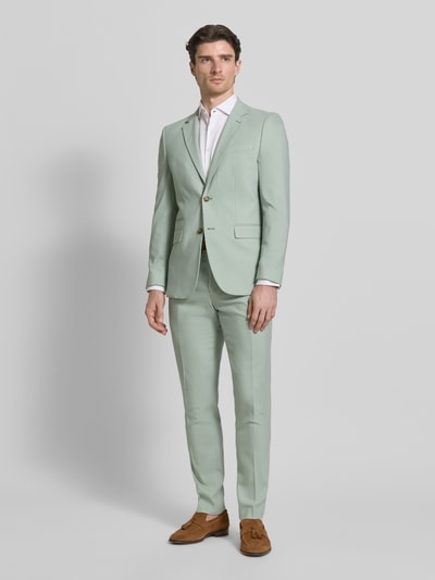 Männermodel trägt Slim Fit Anzugsakko mit Woll-Anteil Modell 'SLIM-NEIL' von SELECTED HOMME, Optik: Unifarben, Ganzkörperansicht von vorne.