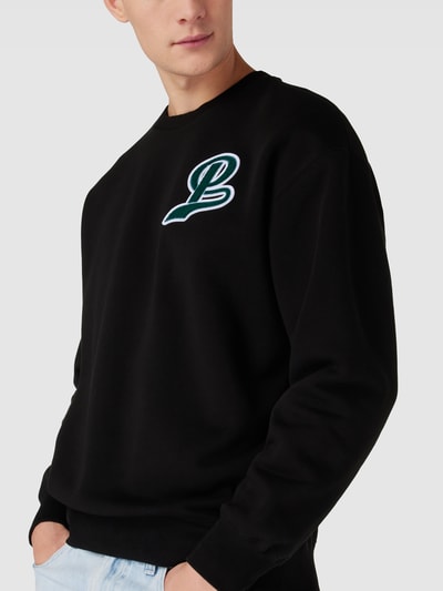 PUMA PERFORMANCE Relaxed Fit Sweatshirt mit Flockprint Black 3